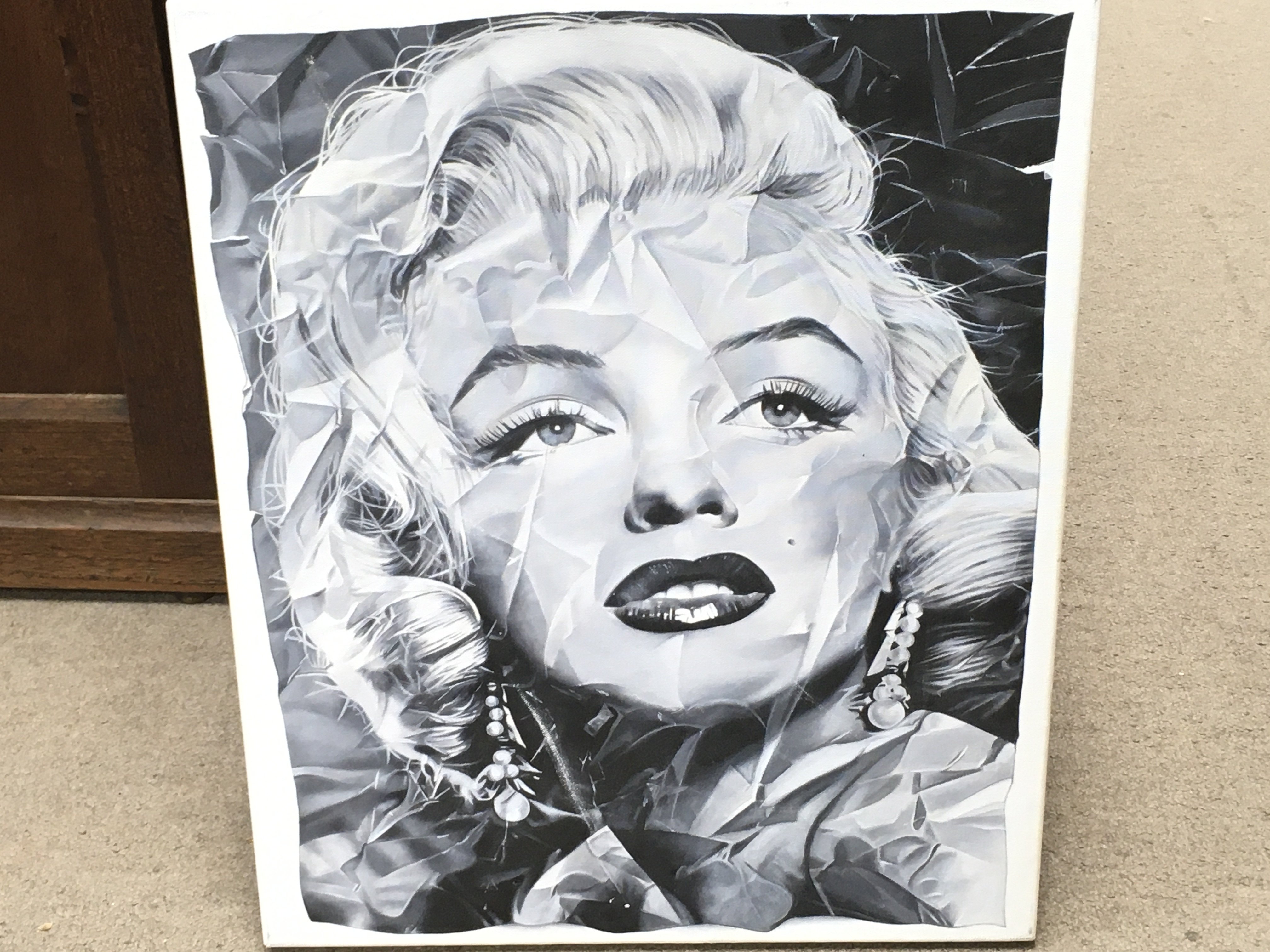 An oil on canvas painting of Marilyn Monroe