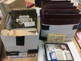 Two boxes containing a collection of GB and world stamps plus some first day covers in binders.