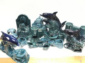 A collection of Turquoise and black ceramics inclu