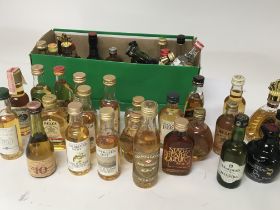 A collection of miniature bottles 50ml of Scotch Whisky and other miniatures (a lot)