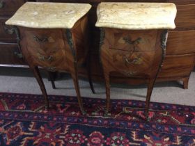 A pair side cabinets the marble tops above two inl