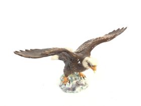 A beswick bald eagle. 33cm wide by 16cm high (appr
