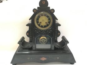 A slate mantle clock (loose foot). 47 x44cm Postag