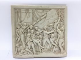 An unglazed composite plaque of the death of Lord Admiral Nelson, approx 35cm x 33cm. Shipping