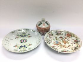 Two Oriental dishes plus a pot and cover (3). Ship