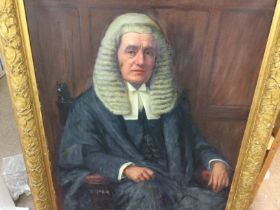 A gilt framed oil on canvas , judge seated 84 cm x115 cm .