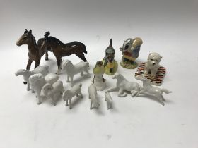 A collection of various ceramic animals including