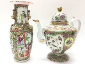 A Cantonese Famille Rose tea pot and vase. Chips a
