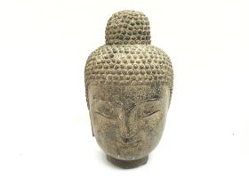 A Chinese granite Buddha head. Approximately 25cm