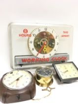 A collection of clocks including Smith, Camerer Cu