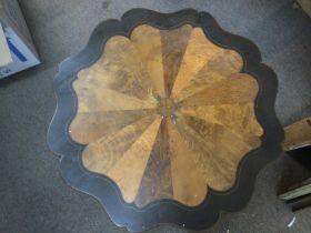 A parquetry occasional table with a shaped top, ap