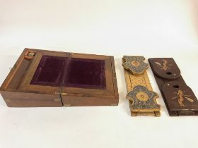 A writing box with ink well and key. Also includes two vintage bookends. Postage B