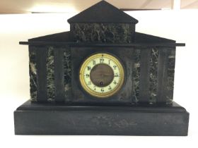 A Slate mantle clock, with pendulum. Dimensions 14