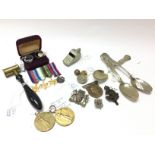 A collection of WW1 and WW2 items including a vict