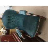 A Victorian open armchair in blue upholstery together with a rocking chair and one other (3).