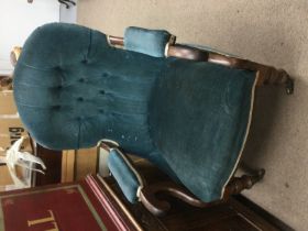 A Victorian open armchair in blue upholstery together with a rocking chair and one other (3).