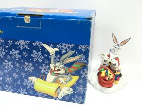 A boxed Looney Tunes Santa Bugs porcelain figurine