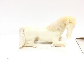 A murano glass horse with COA. 17cm long by 12cm h