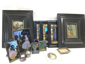 A collection of framed pictures including a collec