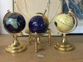 Three small gem stone globes 14 cm .