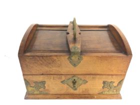 An oak writing box. 31cm wide 25deep and 21cm high