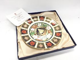 A boxed Royal Crown Derby limited edition plate, p