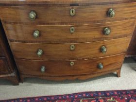 A mahogany bow fronted four drawer chest of drawer