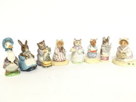 A collection of porcelain animal figurines includi