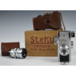 Steky Japan novelty miniature camera to suit 16mm film, with 1:3.5 f=26mm and 1:5.6 f=40mm lenses,
