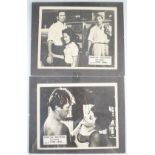 Two Cape Fear movie or film lobby cards, featuring Gregory Peck, Robert Mitchum and Polly Bergen,