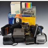 Polaroid and other instant cameras to include Polavision, Polaroid 1000, Polaroid Sun 600,