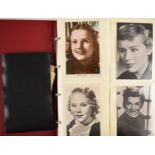 Album of postcards with mainly stars of stage and screen, some signed, includes Kirk Douglas, Hedy