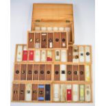 Case of approximately 42 late 19th or early 20thC microscope slides to include moth eggs, locust
