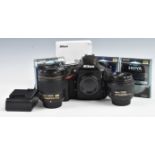 Nikon D810 digital SLR camera outfit with N28mm 1:1.8G and 50m 1:1.4G lenses, HB-64 and HB-47 hoods,