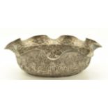 Burmese or Indian silver bowl with embossed decoration of various animals, length 14.5cm, weight