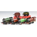 Four Hornby 0 gauge clockwork locomotives including LMS 2270, 50153, 3425, 500 etc and two tenders