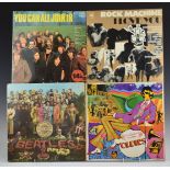 A collection of 12 albums including The Beatles, The Moody Blues, samplers and soundtracks