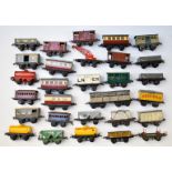 Twenty nine Hornby 0 gauge model railway wagons, vans, coaches and trucks including Saxa Salt, Shell