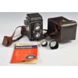 MPP Microcord TLR camera with 77.5mm f3.5 lens, in leather case with guide book