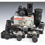 Eight 35mm SLR cameras comprising Fujica AZ-1 with 1:2.2 55m lens, Praktica LLC with 1.8/50 lens,
