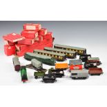 Nineteen Hornby Dublo 00 gauge model railway locomotives, coaches, wagons and accessories