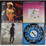 Approximately 60 twelve inch singles, picture discs and promos including Bruce Springsteen, The