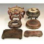 Six Chinese 19th / 20thC carved hardwood stands, tallest 19cm, maximum diameter 21cm