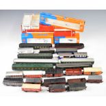 Twenty four Roco, Jouef and similar 00 gauge model railway continental goods wagons and coaches,