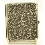 Indian silver cigarette case with embossed decoration of deities, length 8cm, weight 110g