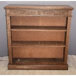 Oak bookcase with carved decoration, W109 x D33 x H114cm