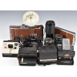 Collectable cameras to include Canon A-1 35mm SLR with 50mm 1:1.4 lens, Polaroid SX-70, Polaroid 95A