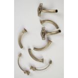 Six tracheostomy tubes including two Jackson type four medical examples together with two inner