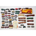 Hornby Dublo 00 gauge model railway rolling stock comprising fifty loose goods wagons, seven