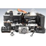 Collectable cameras to include Zenit EM 1980 Olympic SLR, Voigtlander folding camera, Rollei B35 and